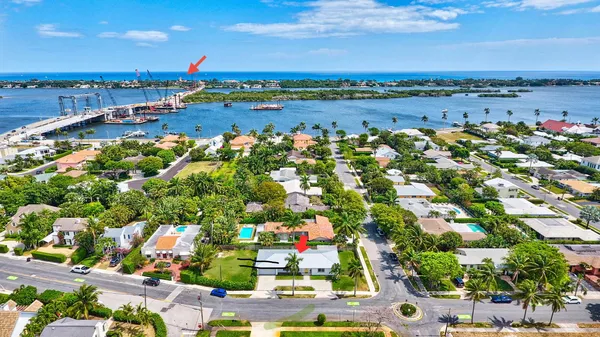 an aerial view of residential building and lake