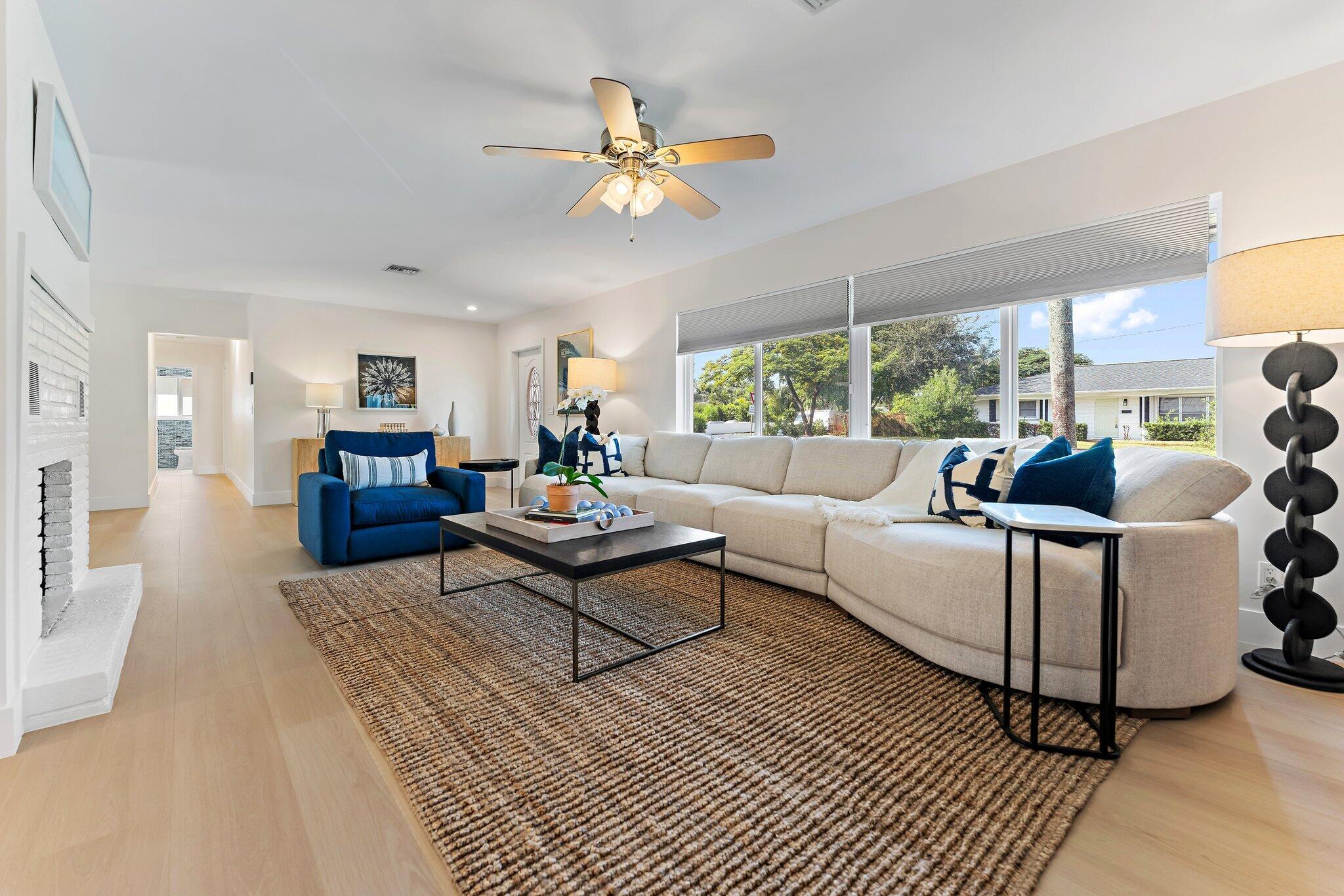 4300 Washington Road West Palm Beach, FL 33405 - Photo 7 of 27 a living room with furniture and a large window