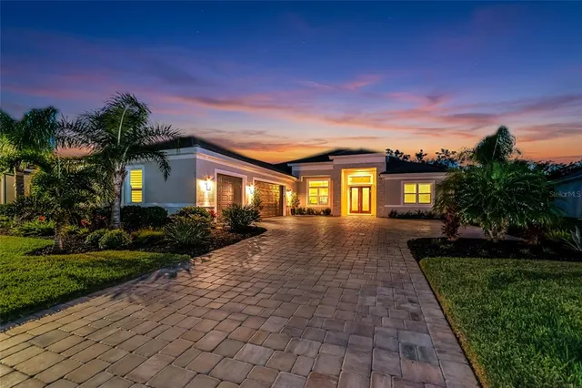 a view of house with a yard