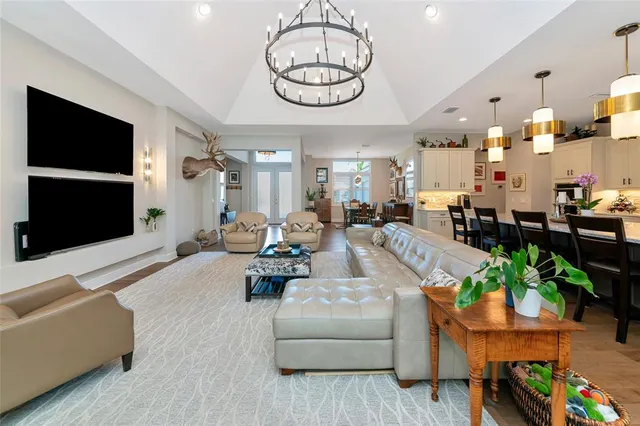 a large kitchen with lots of counter space and breakfast area