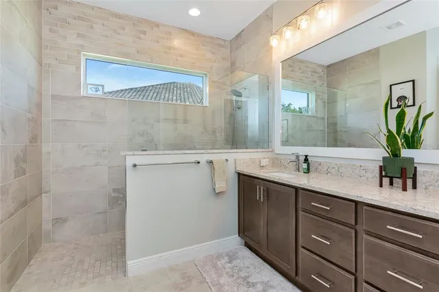 a living room with lots of furniture and a flat screen tv