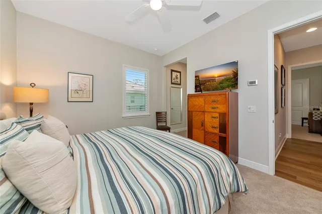 a view of a patio with a table and chairs