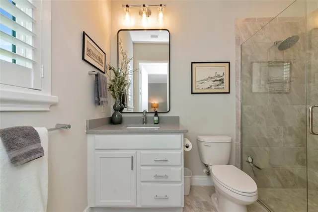 a view of swimming pool with sitting area