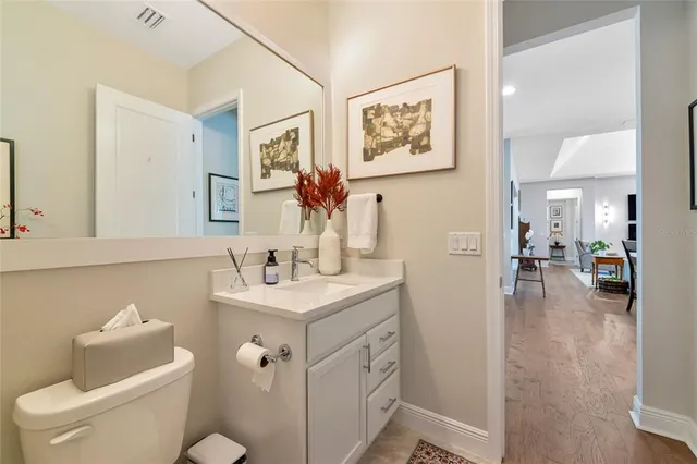 a kitchen with a table chairs and a stove
