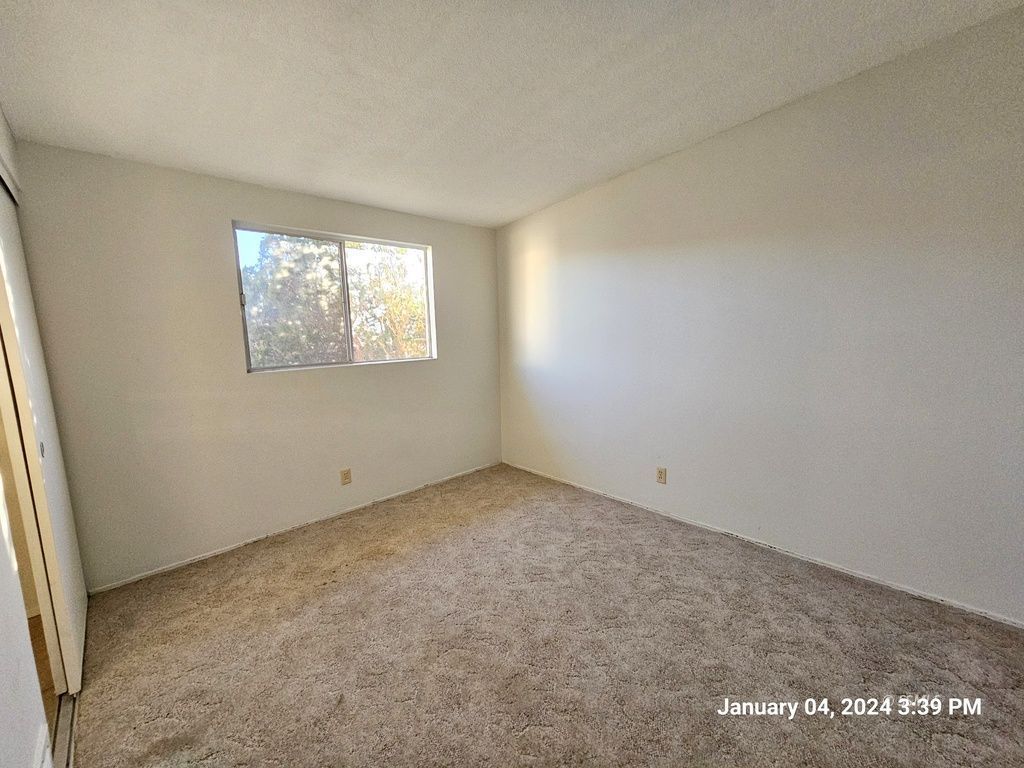 439 West Reeves Avenue Ridgecrest, CA 93555 - Photo 12 of 20 an empty room with windows