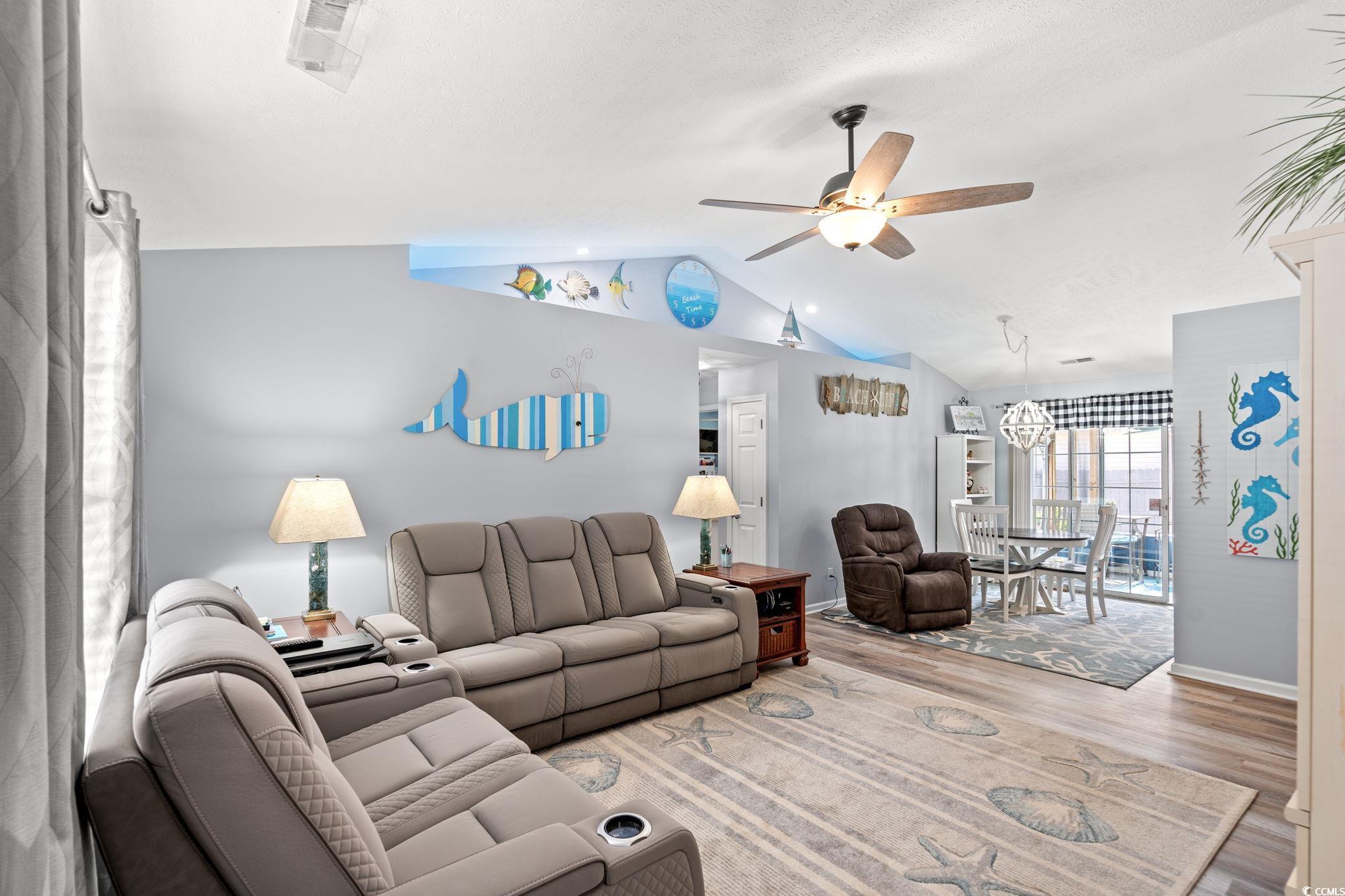 1283 Pollen Loop Murrells Inlet, SC 29576 - Photo 7 of 40 featuring vaulted ceiling, with remote controlled colored mood lighting, ceiling fan
