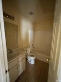 a bathroom with a sink a toilet and a shower