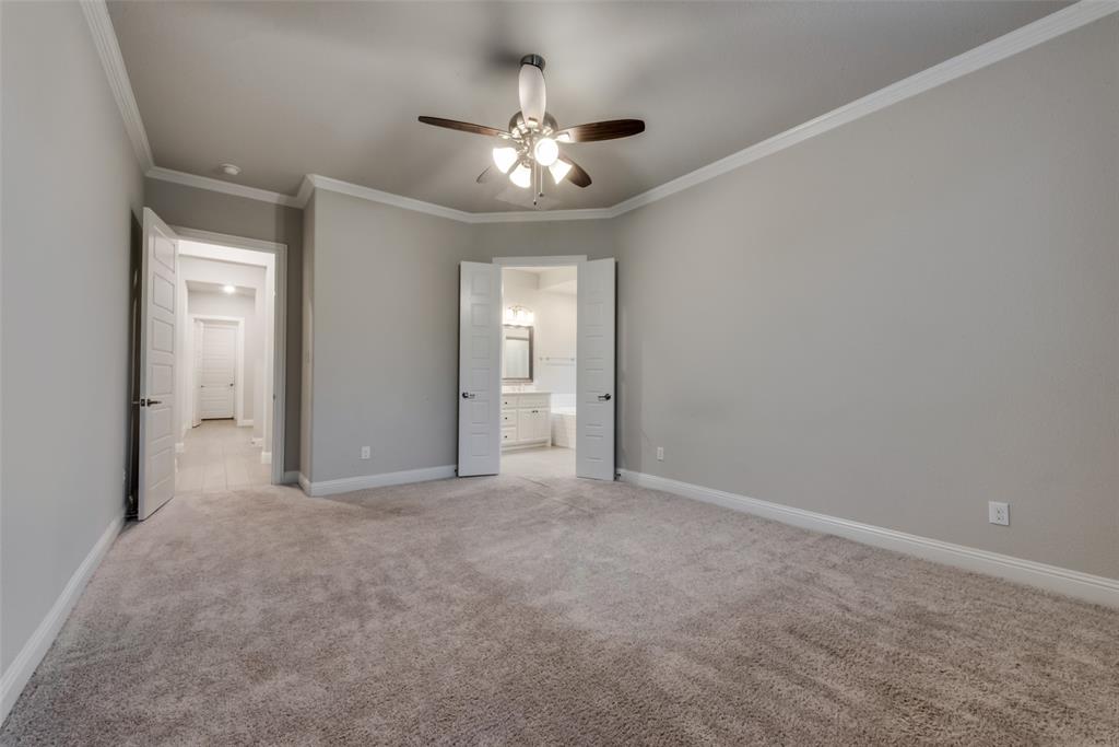 611 Windy Ridge Lane Rockwall, TX 75087 - Photo 24 of 36 Primary Bedroom