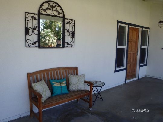 723 West Kevin Court Ridgecrest, CA 93555 - Photo 4 of 48 a living room with furniture and a window