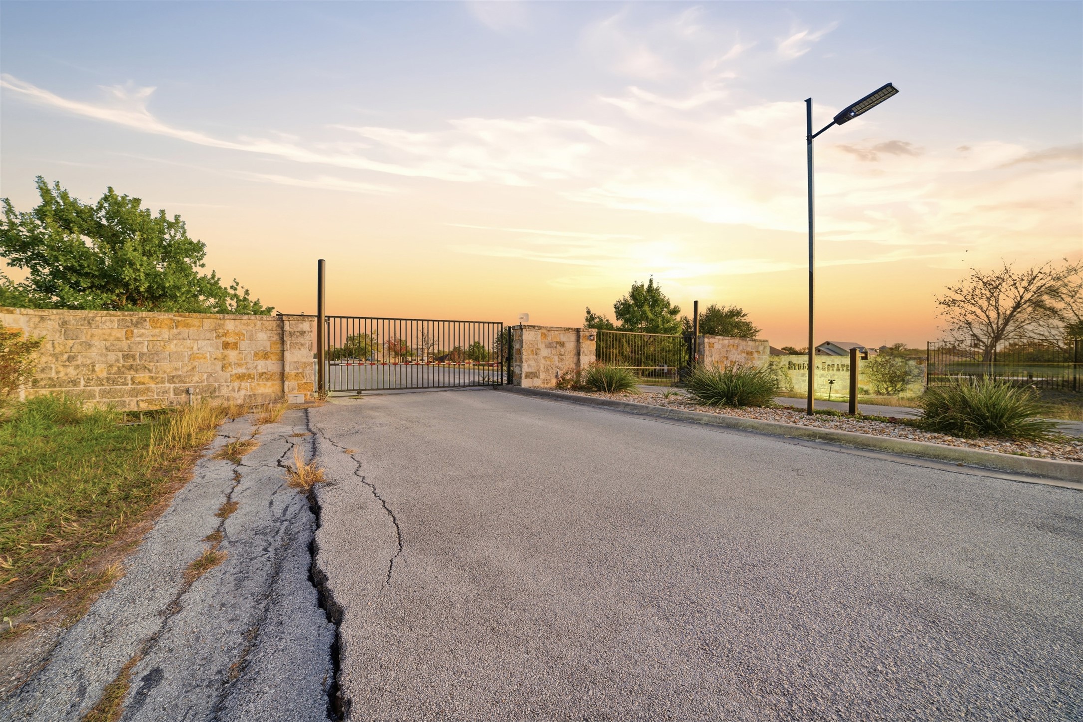 120 Hope Street Kyle, TX 78640 - Photo 11 of 12 Front Gated Entry of Studio Estates