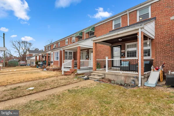 a front view of a building with a large windows