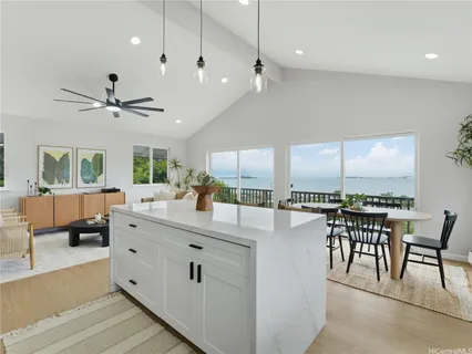a very nice looking dining room with a large window