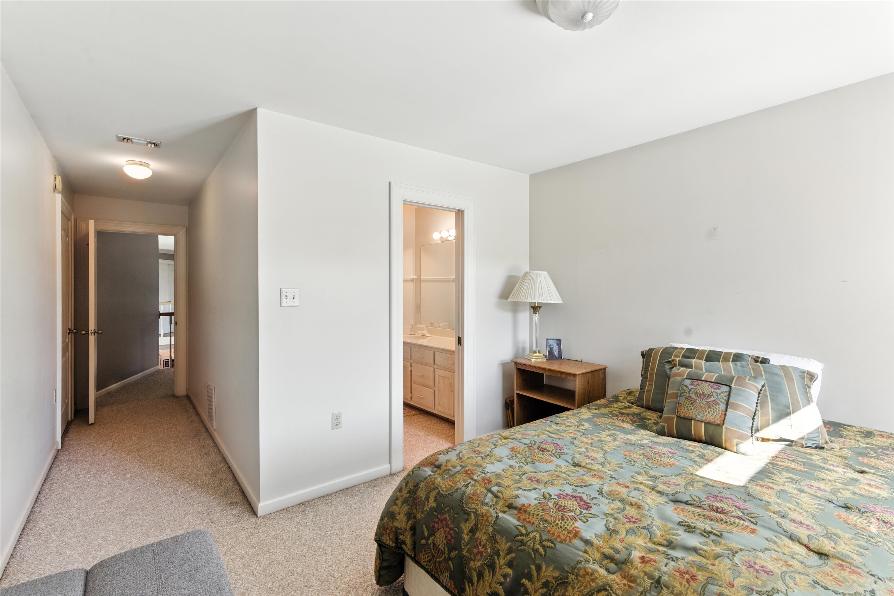 1452 Solo Road Covington, TN 38019 - Photo 27 of 39 a bedroom with a bed and a couch