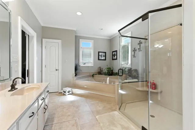 a room with a sink and a mirror