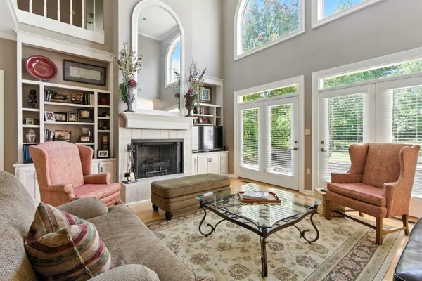 a living room with furniture and a window