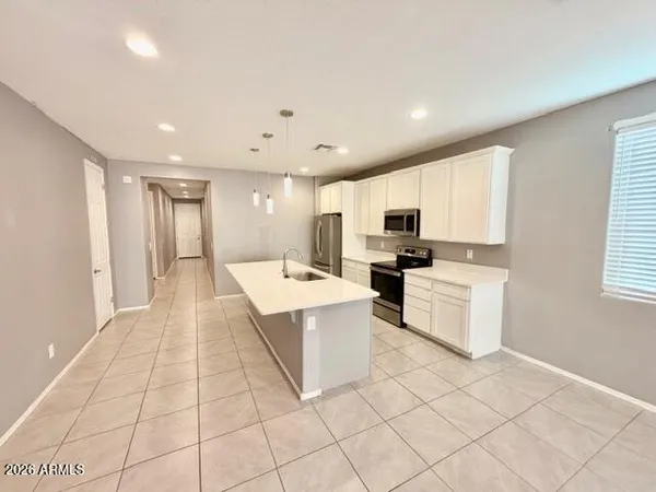 a view of kitchen with windows
