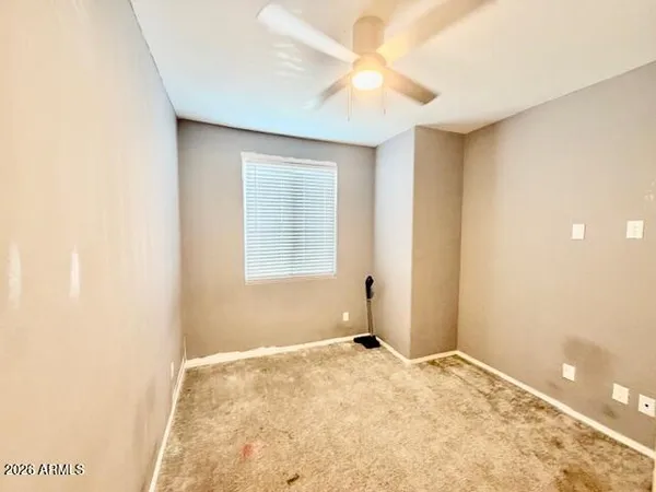 a view of a bedroom with a natural light
