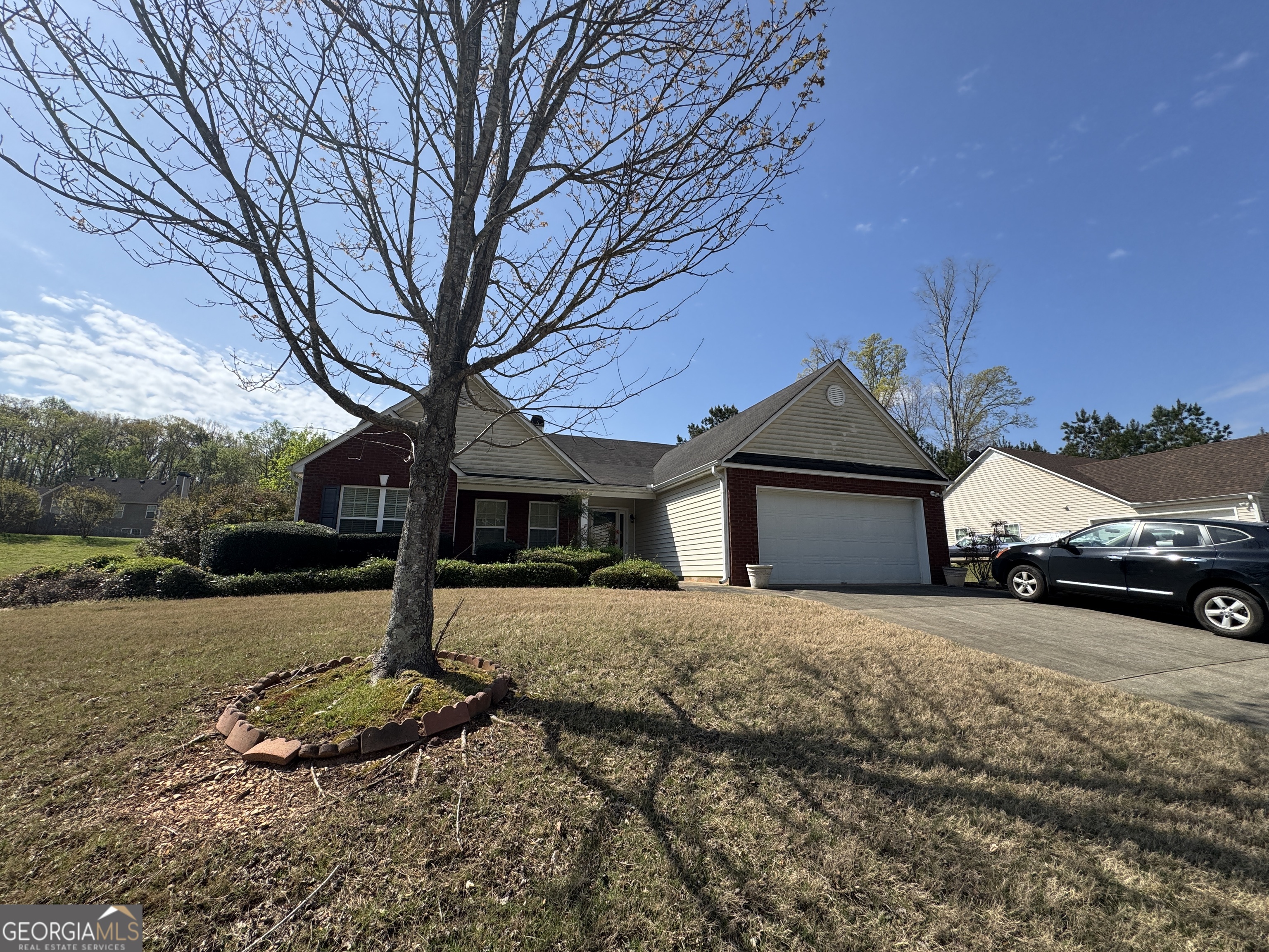 36 Windcrest Terrace Covington, GA 30016 - Photo 1 of 32 a front view of a house with a yard covered in snow