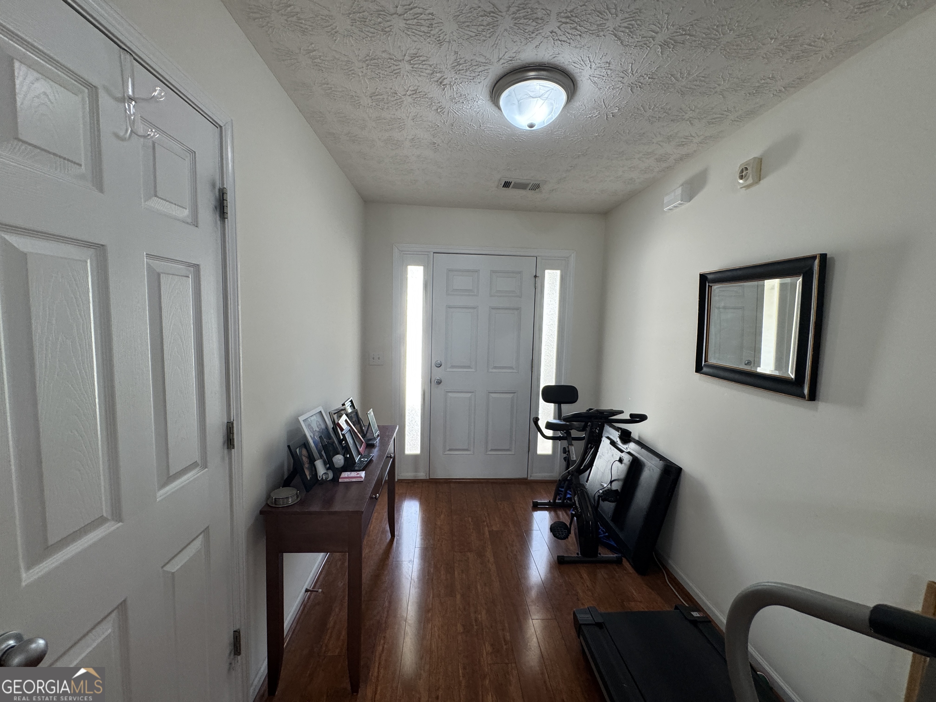 36 Windcrest Terrace Covington, GA 30016 - Photo 2 of 32 a view of a workspace with furniture and a window