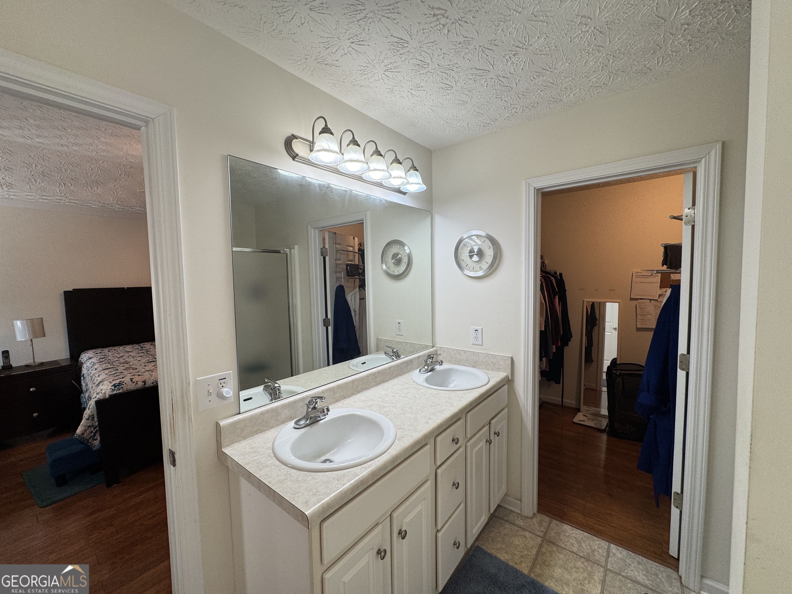 36 Windcrest Terrace Covington, GA 30016 - Photo 22 of 32 a bathroom with a sink and a mirror