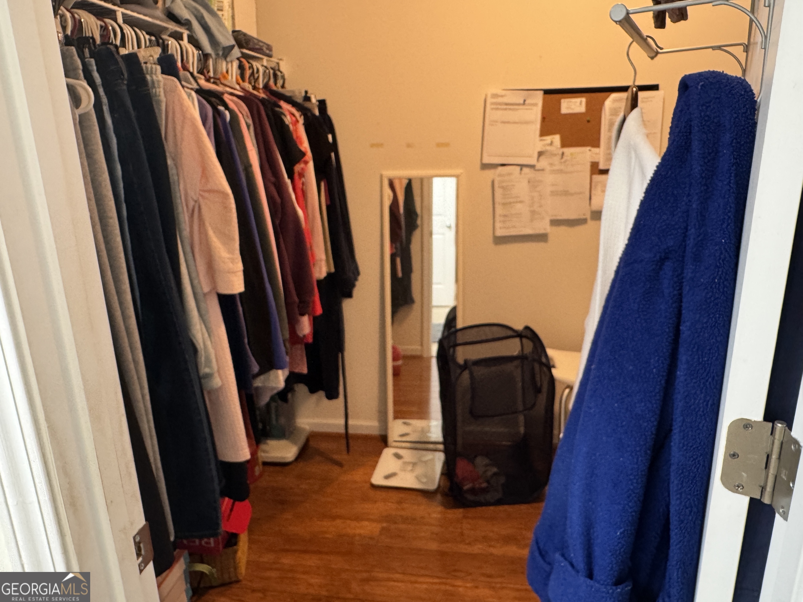 36 Windcrest Terrace Covington, GA 30016 - Photo 23 of 32 a view of walk in closet with clothes and shoes