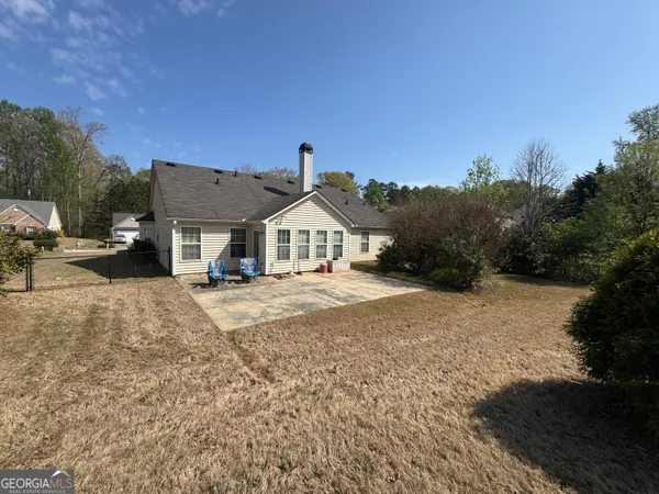 a view of house with outdoor space and street view