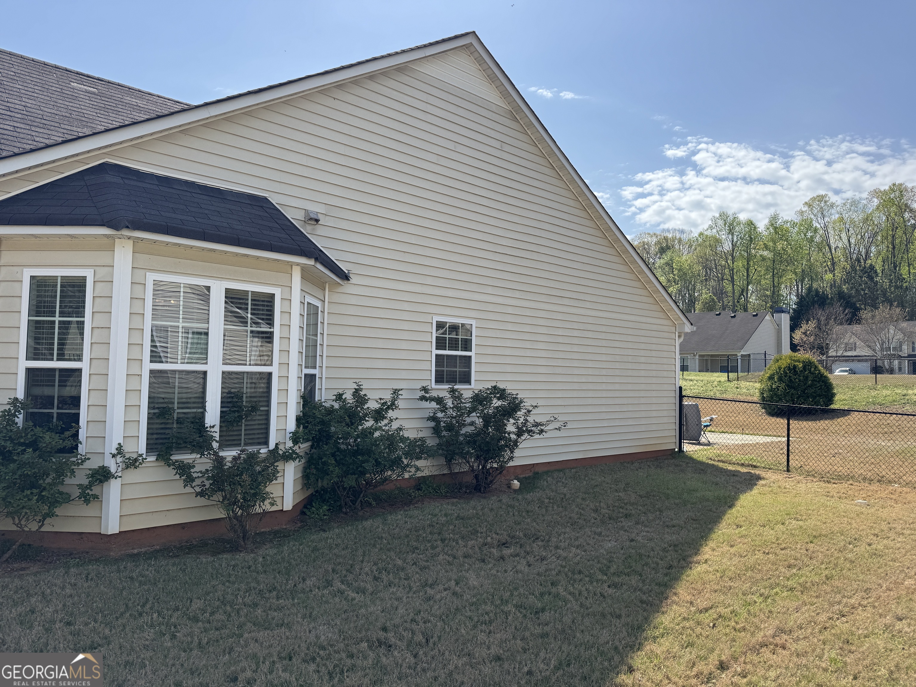 36 Windcrest Terrace Covington, GA 30016 - Photo 30 of 32 a view of a house with patio