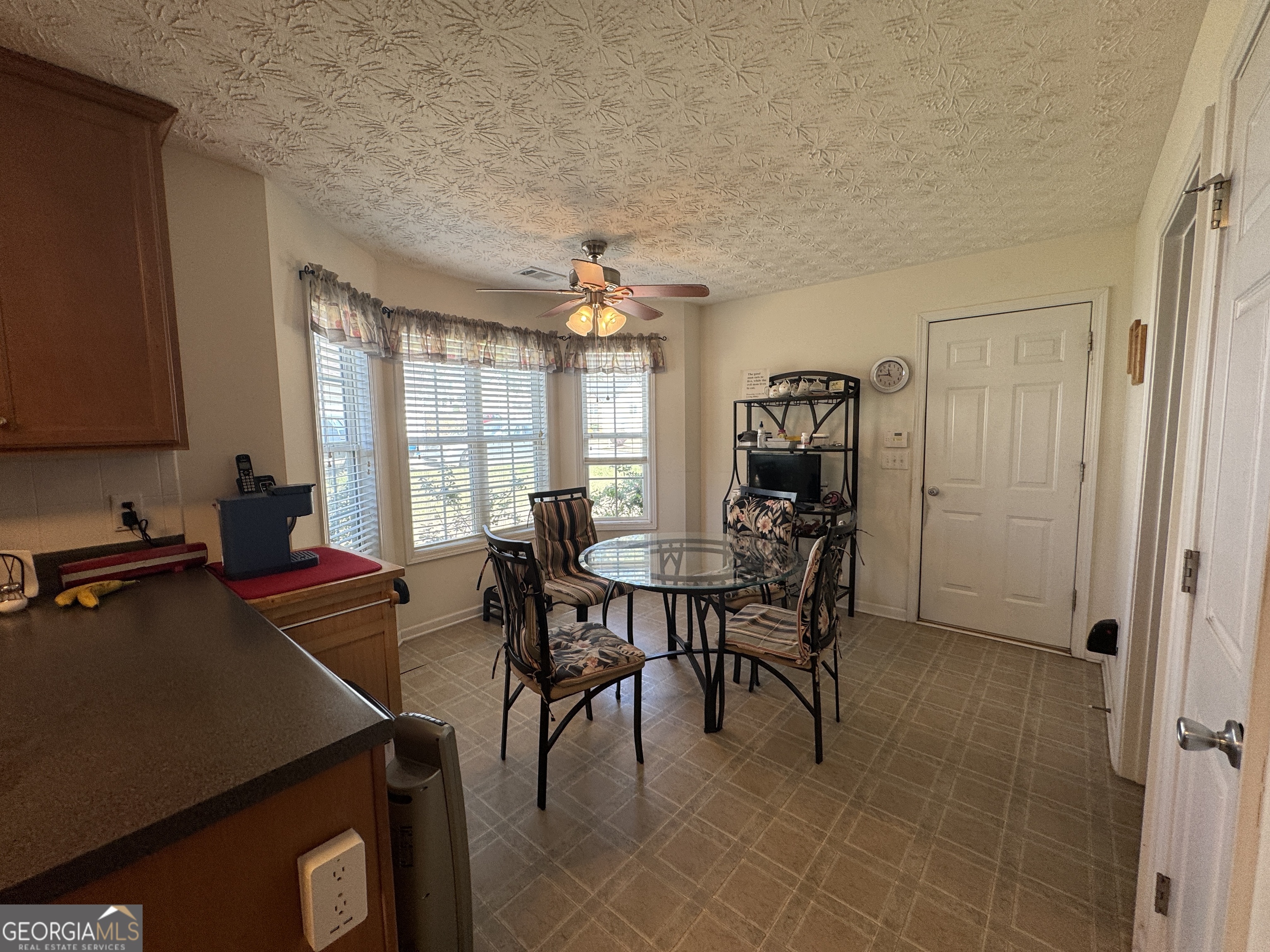 36 Windcrest Terrace Covington, GA 30016 - Photo 9 of 32 a view of a dining room with furniture window and outside view