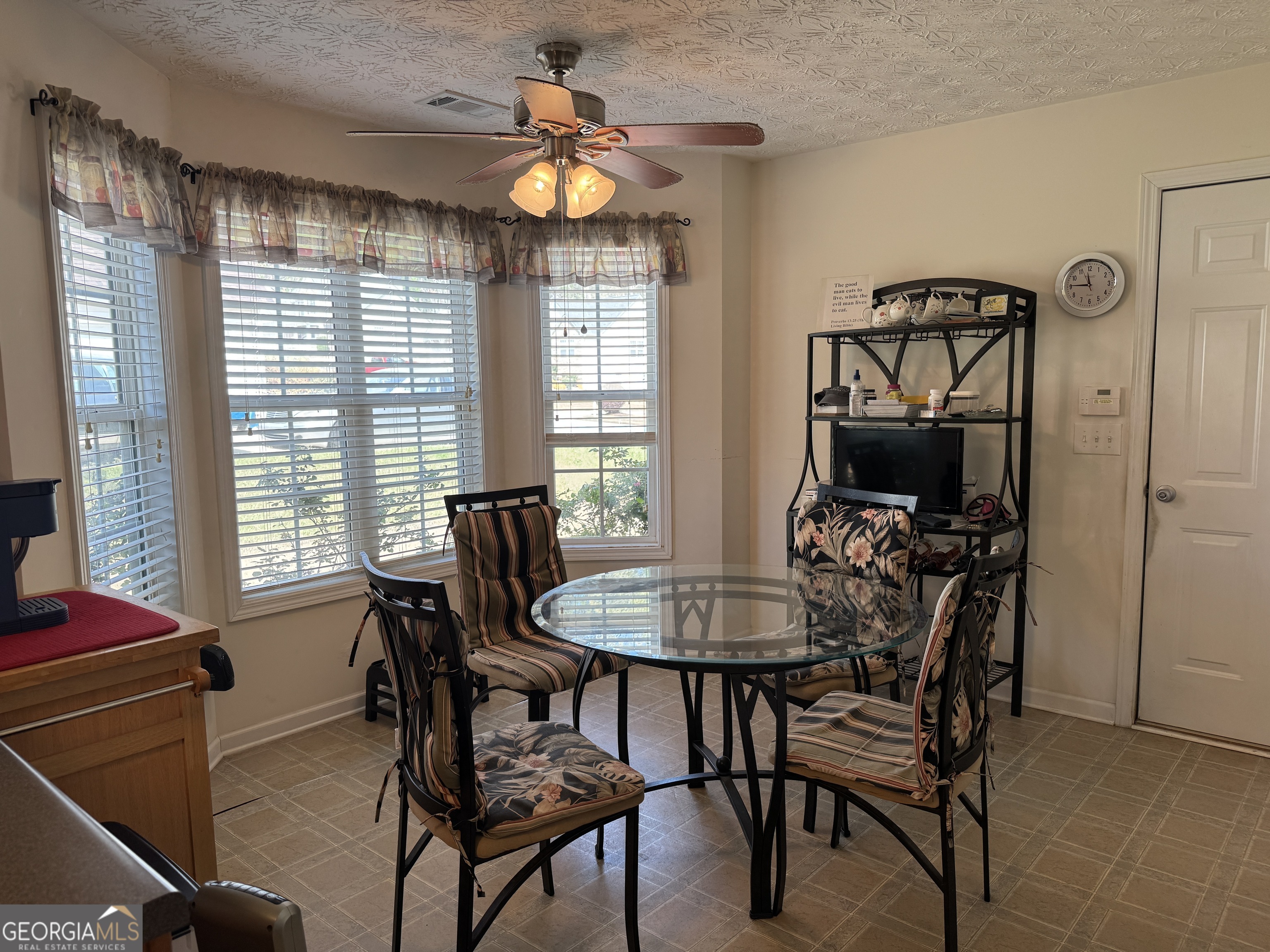 36 Windcrest Terrace Covington, GA 30016 - Photo 10 of 32 a view of a dining room with furniture and a window