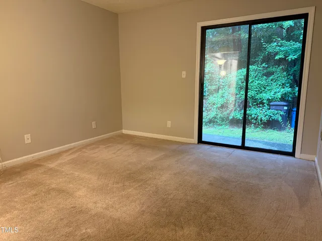 a view of a room with a large window