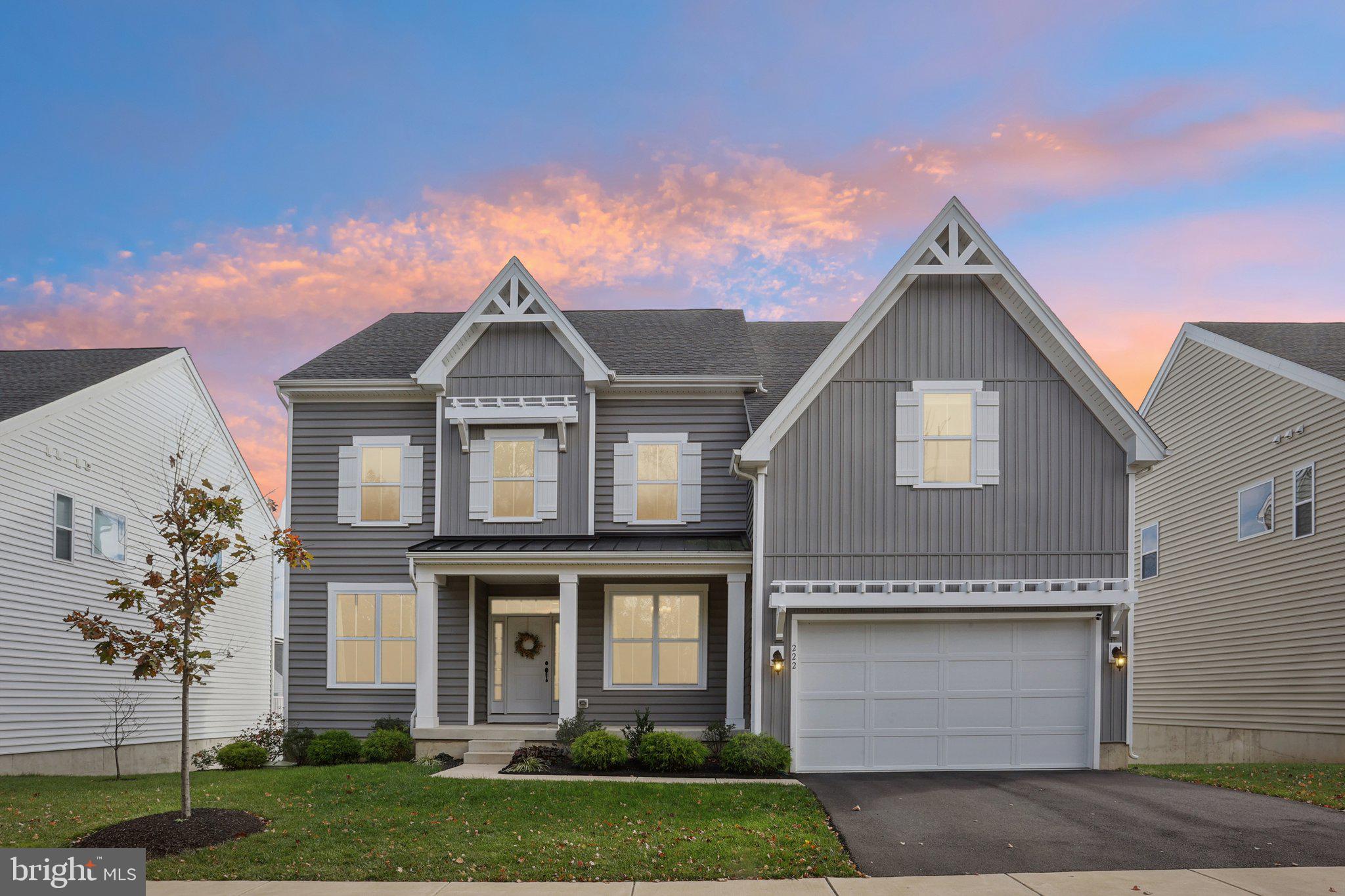 222 Grv Vly Court Chalfont, PA 18914 - Photo 2 of 46 a front view of a house with a yard and garage