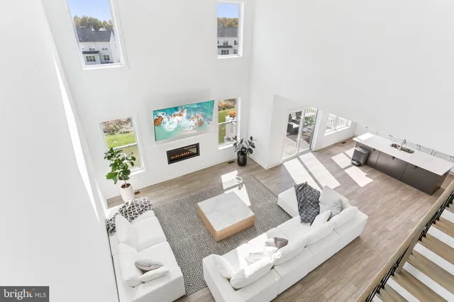 a spacious bedroom with a bed and a window