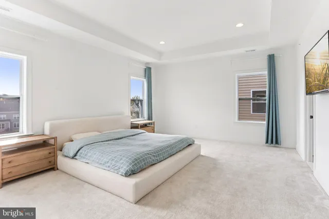 a living room with furniture and window