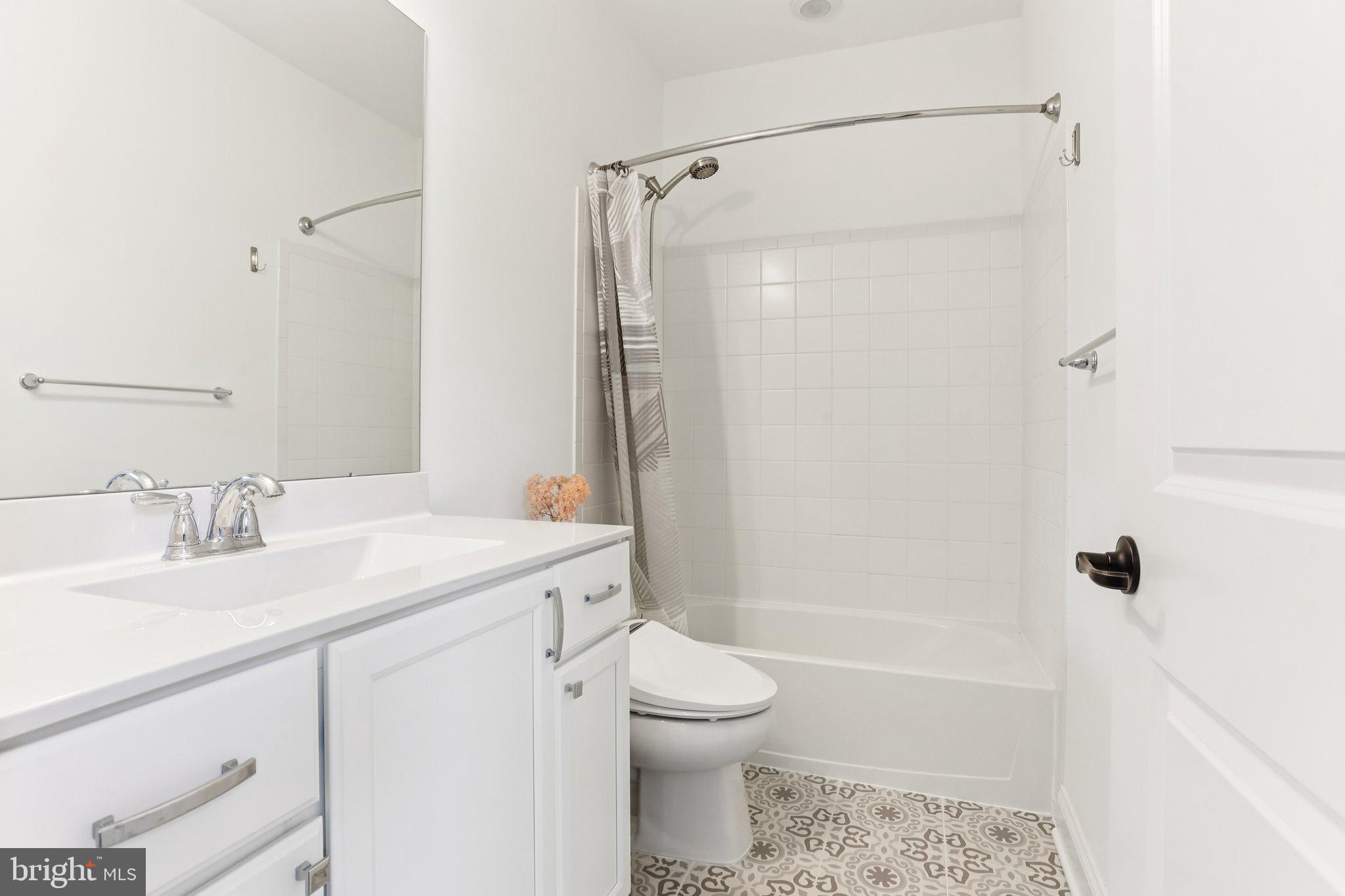 222 Grv Vly Court Chalfont, PA 18914 - Photo 29 of 46 a bathroom with a sink a toilet and shower