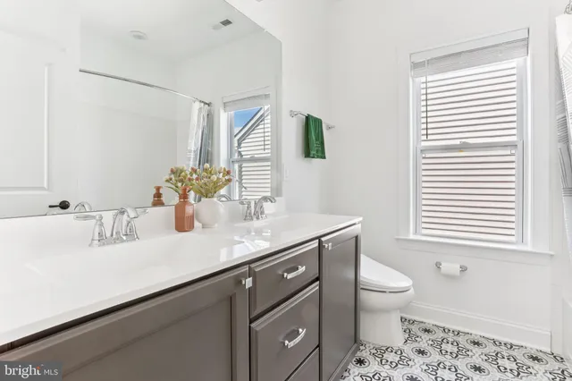 a workspace with furniture and a window