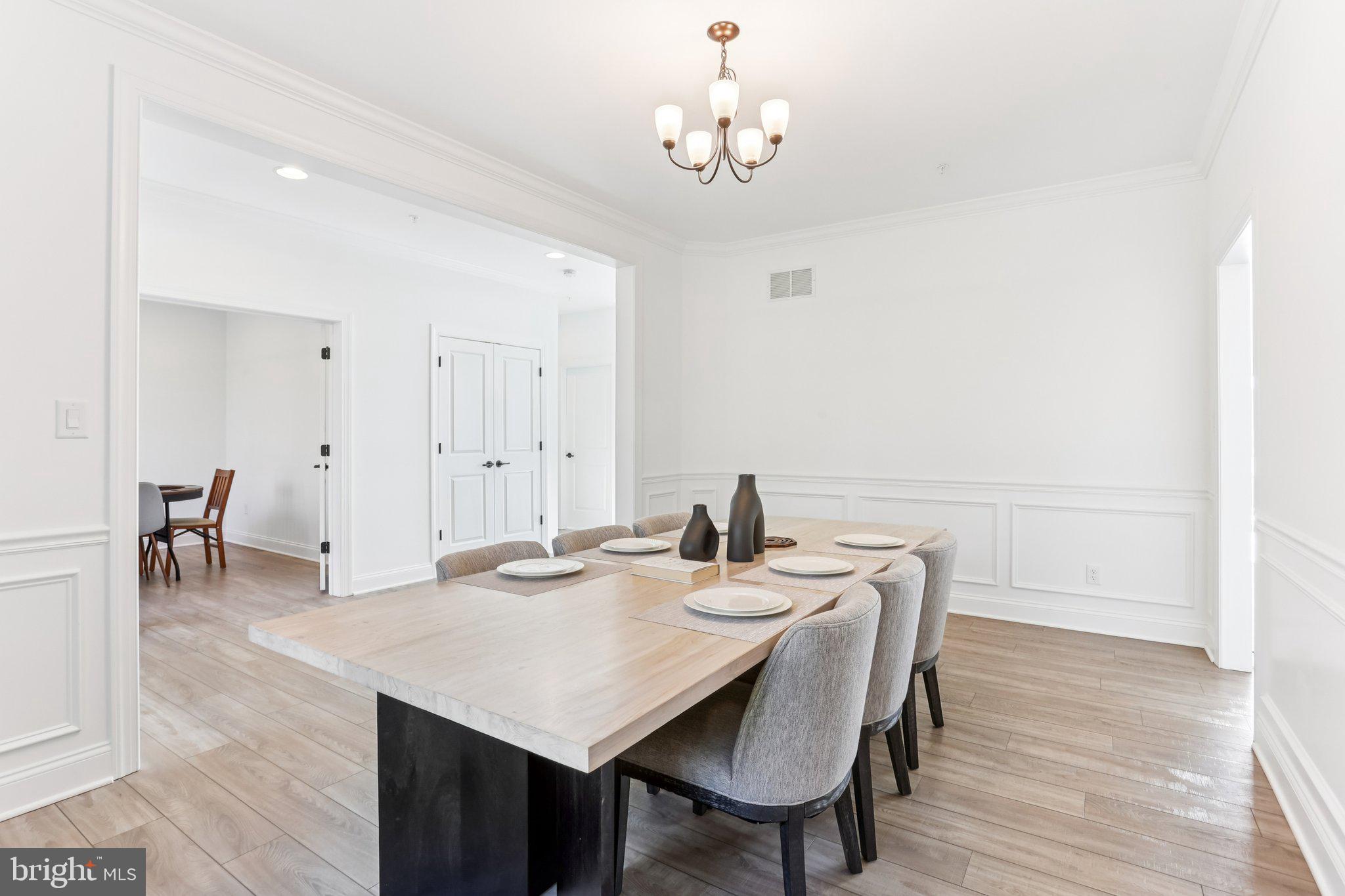 222 Grv Vly Court Chalfont, PA 18914 - Photo 7 of 46 a view of a dining room with furniture and wooden floor