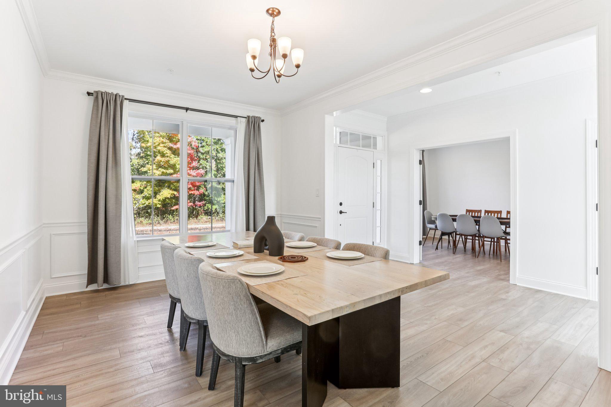 222 Grv Vly Court Chalfont, PA 18914 - Photo 8 of 46 a view of a dining room with furniture window and wooden floor