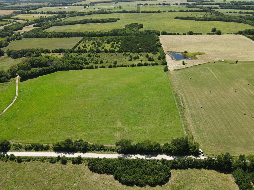 4145 County Road 4145 Bonham, TX 75418 - Photo 3 of 10 a view of a field with an outdoor space