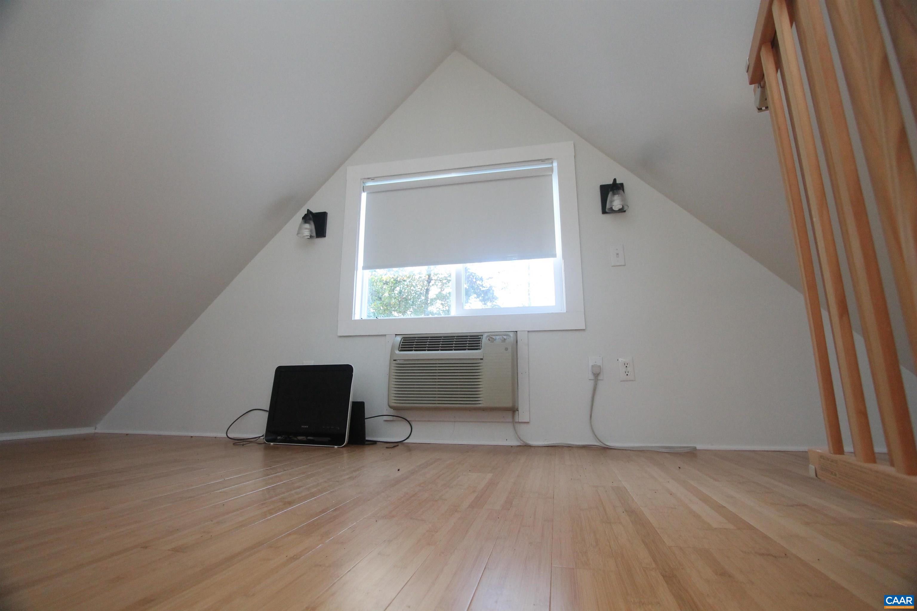 Tbd Batesville Road Afton, VA 22920 - Photo 6 of 16 an empty room with wooden floor and windows