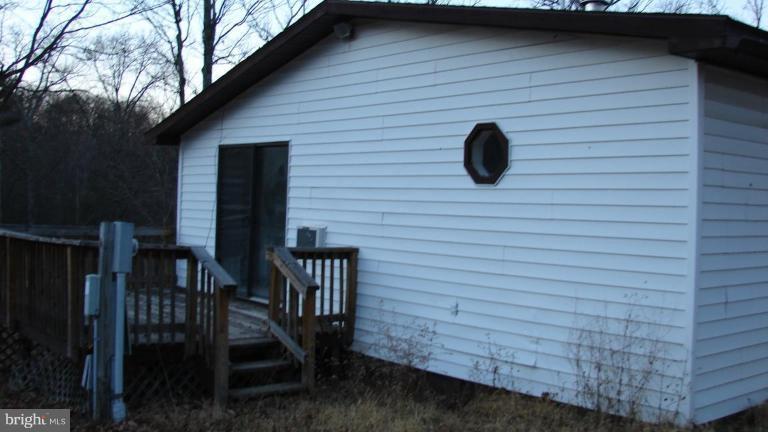 91 Ball Run Road Great Cacapon, WV 25422 - Photo 4 of 26 a view of entryway door