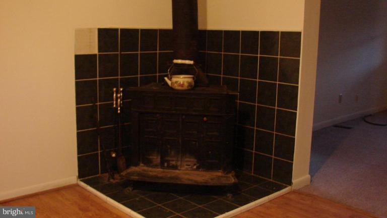 91 Ball Run Road Great Cacapon, WV 25422 - Photo 6 of 26 a bathroom with a toilet