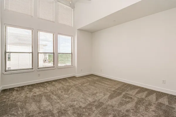 an empty room with a bathroom