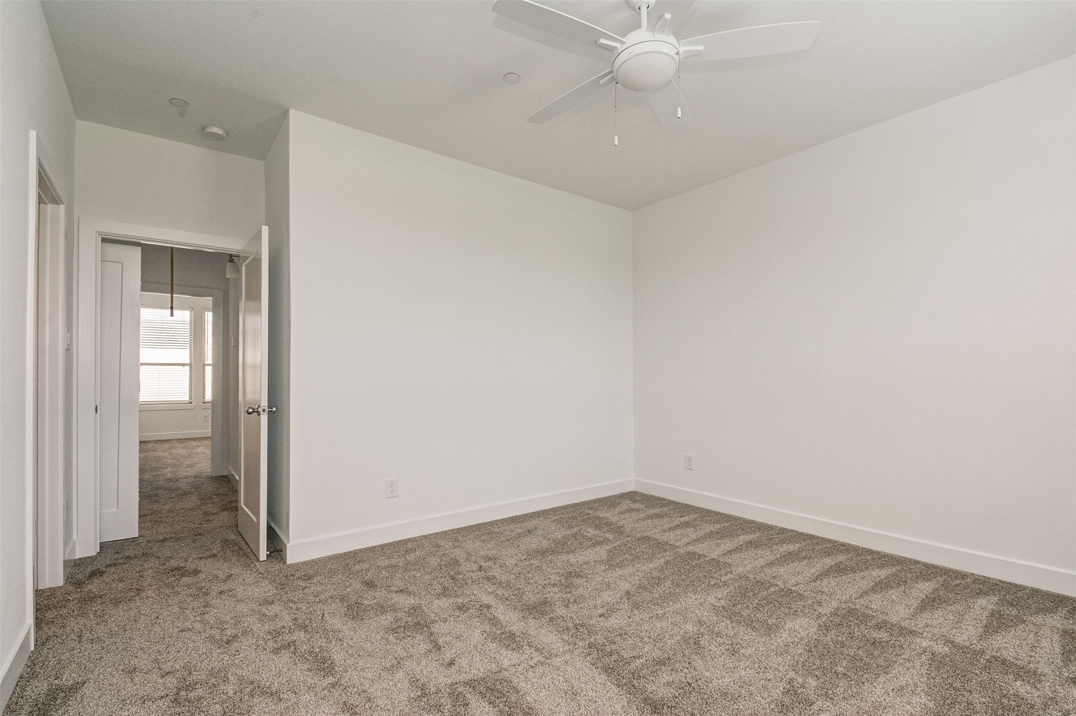 482 South Centro Circle Conroe, TX 77385 - Photo 20 of 23 an empty room with a fan