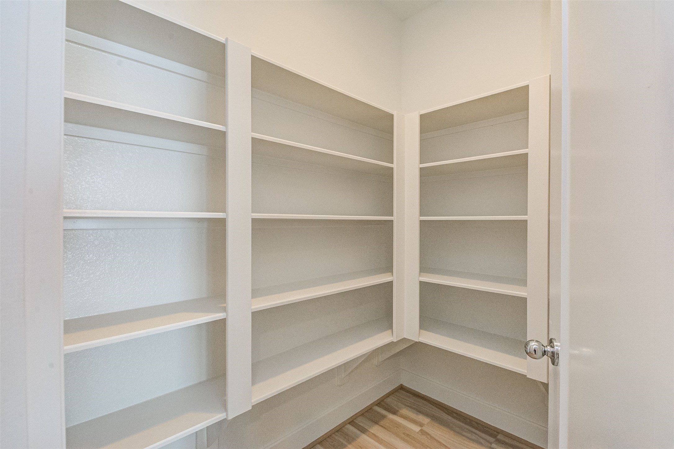 482 South Centro Circle Conroe, TX 77385 - Photo 7 of 23 a view of walk in closet with empty racks