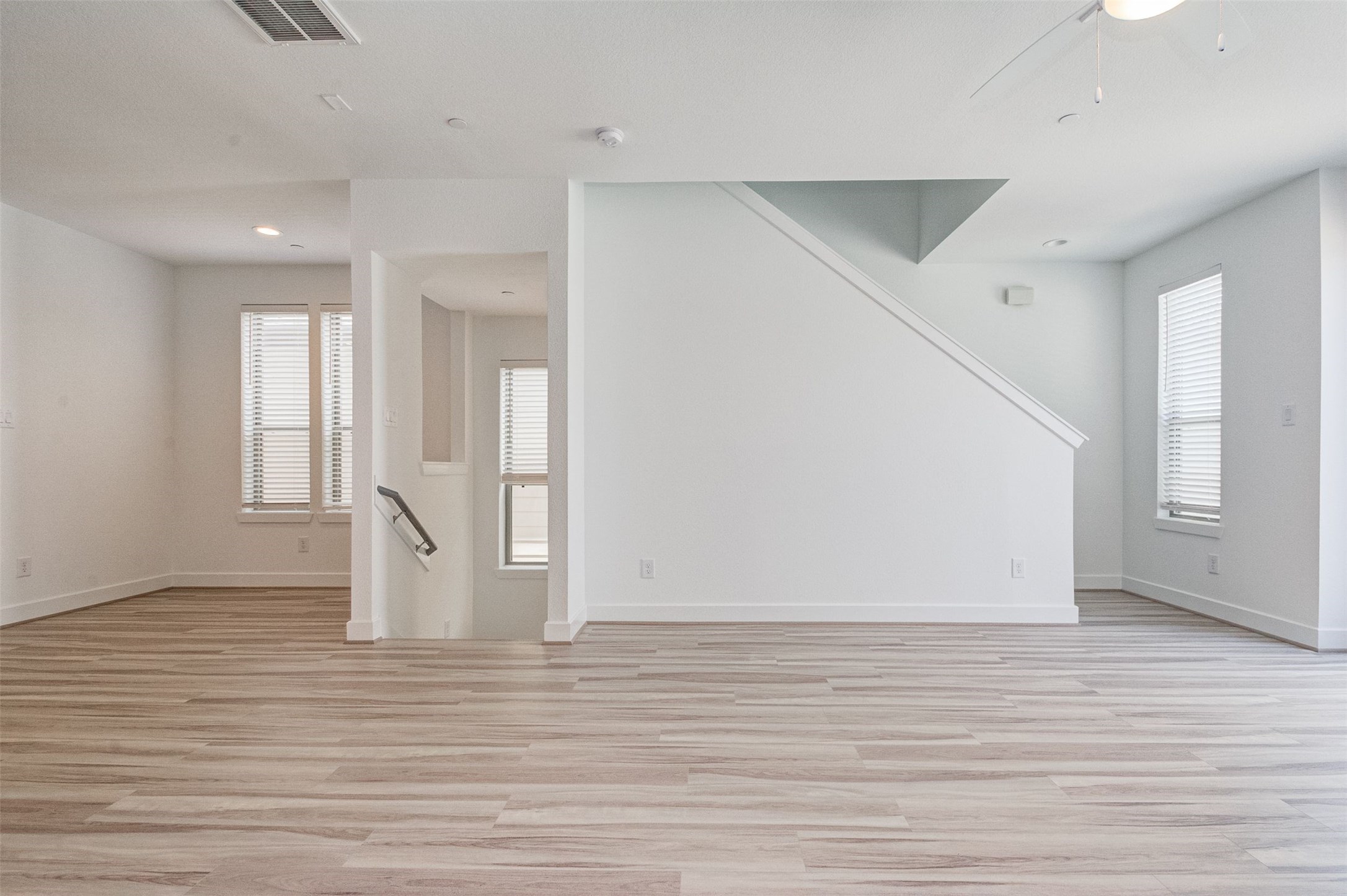 482 South Centro Circle Conroe, TX 77385 - Photo 9 of 23 a view of empty room with wooden floor and fan