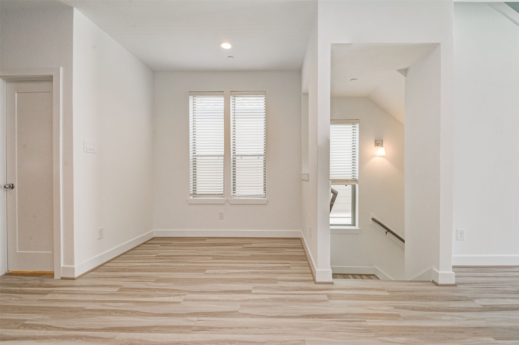 482 South Centro Circle Conroe, TX 77385 - Photo 10 of 23 a view of empty room with wooden floor and fan