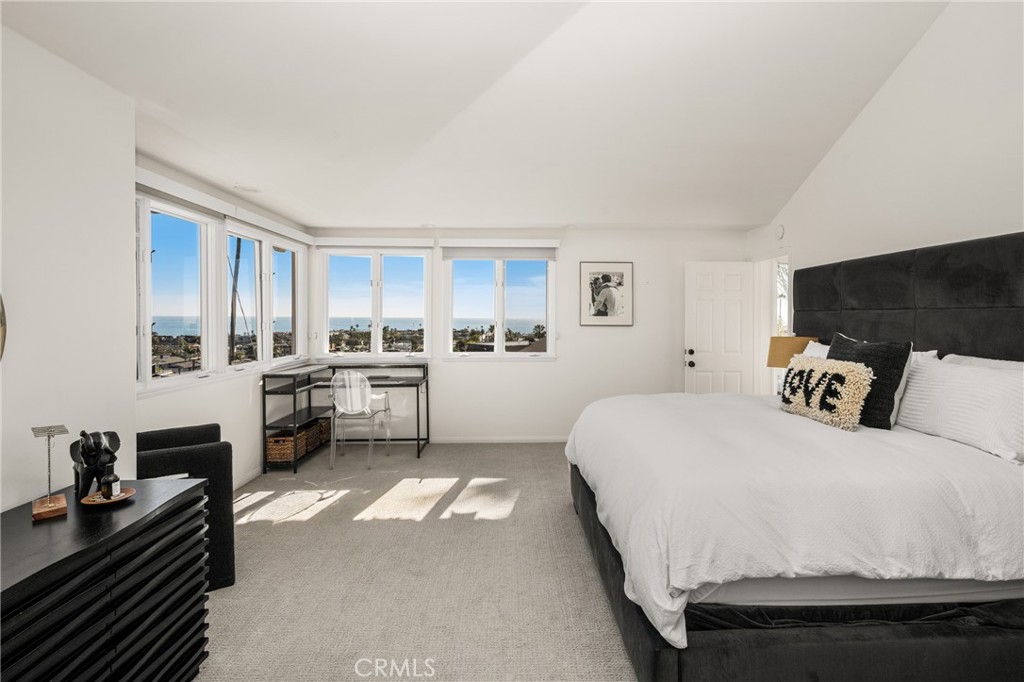 33812 Castano Drive Dana Point, CA 92629 - Photo 19 of 41 Primary bedroom with expansive corner windows for great ocean views.
