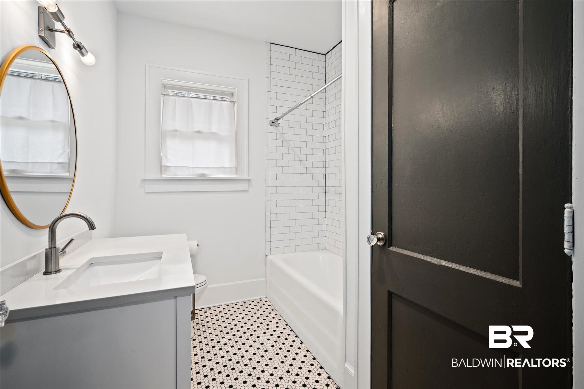 308 South Ann Street Mobile, AL 36604 - Photo 22 of 30 Full bathroom featuring vanity, toilet, and tiled shower / bath combo