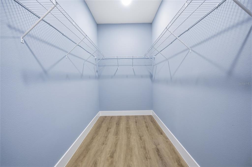 13186 Southwest 52nd Lane Road Ocala, FL 34481 - Photo 27 of 37 a view of a room with racks on the wall