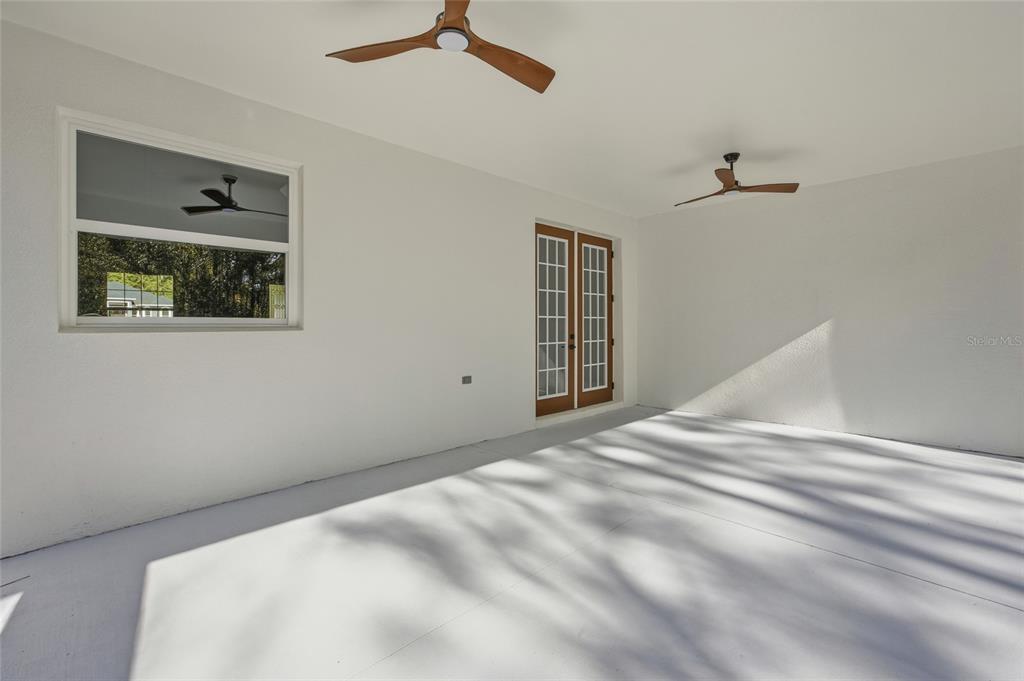 13186 Southwest 52nd Lane Road Ocala, FL 34481 - Photo 30 of 37 a view of empty room with windows